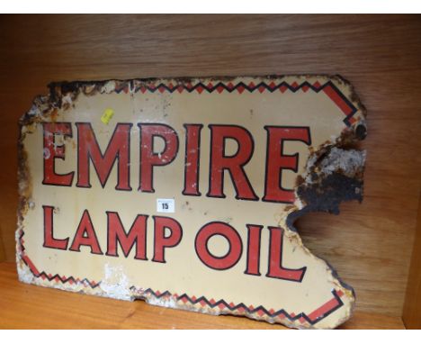 An enamel sign for Empire Lamp Oil (damage)