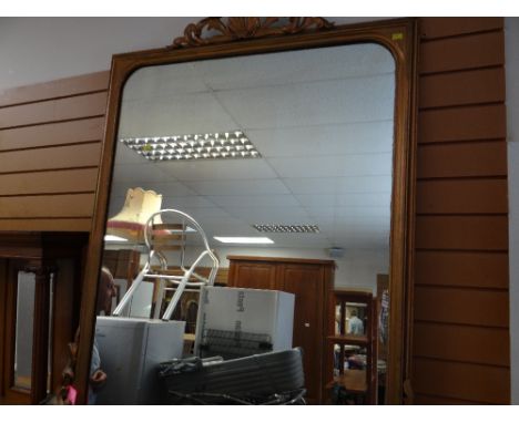 A large vintage gilt framed mirror