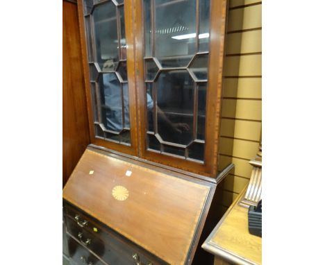 A vintage bureau bookcase