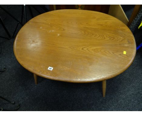 A mid-century lightwood Ercol oval coffee table