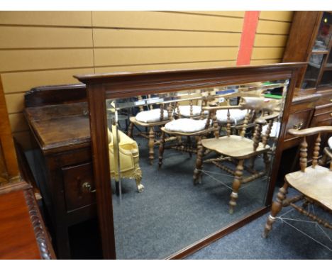 A vintage bevelled overmantel mirror