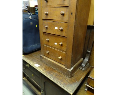 A vintage oak Wellington-type seven-drawer chest & a vintage sideboard