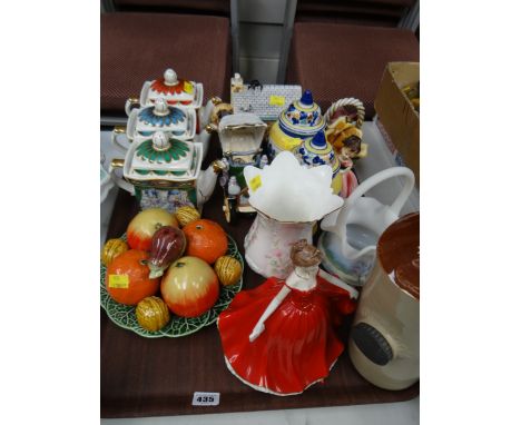 A tray of pottery items including novelty teapots, vases, ceramic hot water bottle & figurines etc
