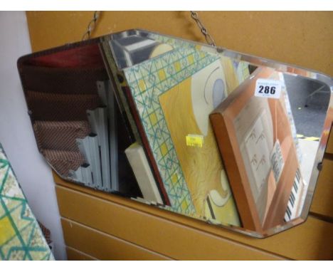 A vintage bevelled wall mirror