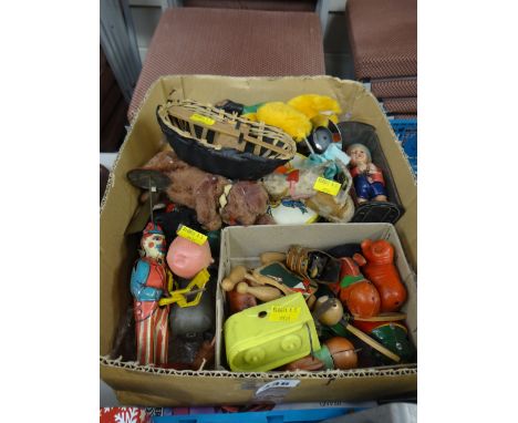 A box of small vintage child's toys including tin plate, figurines etc together with a boxed Star Wars Monopoly board game