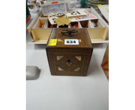 An unusual brass & mother of pearl inlaid tea caddy