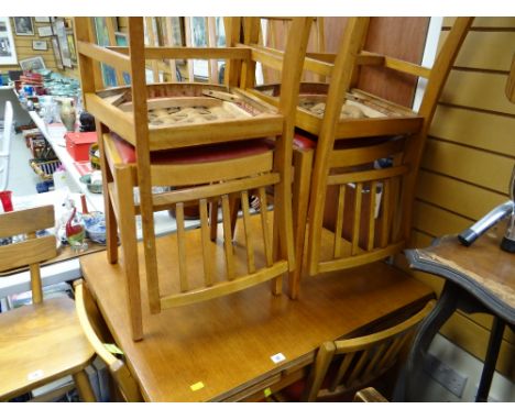 A mid-century extending kitchen table & six chairs