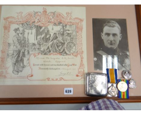 A framed honorary discharge notice for Augustus Reginald Morgan-Smith together with his silver inscribed cigarette case, two 