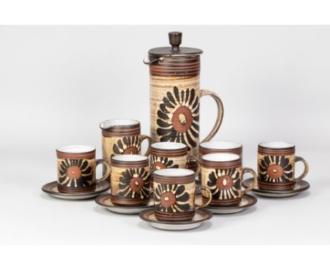 Briglin Pottery; a tin glazed earthenware coffee set with flower decoration, comprising coffee pot, milk jug, sugar bowl and 