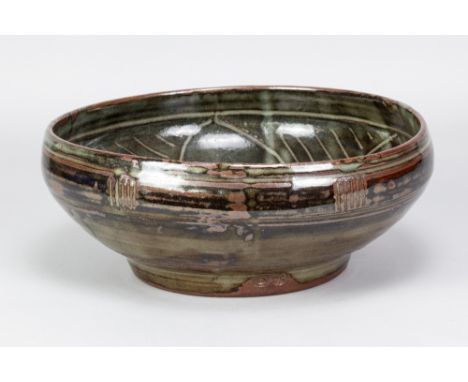 MICHAEL CARDEW (1901-1983) for Wenford Bridge Pottery; a large stoneware bowl with lightly incised decoration on dark grey/te
