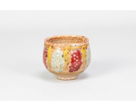 JANICE TCHALENKO (1942-2018); a stoneware yunomi covered in shino glaze with polychrome decoration, impressed JT mark, made 1