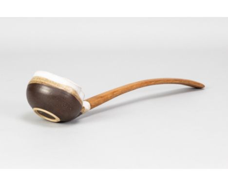 MARIANNE DE TREY (1913-2016); a stoneware ladle with tin and manganese 'Pattern 1' decoration and original long wooden handle