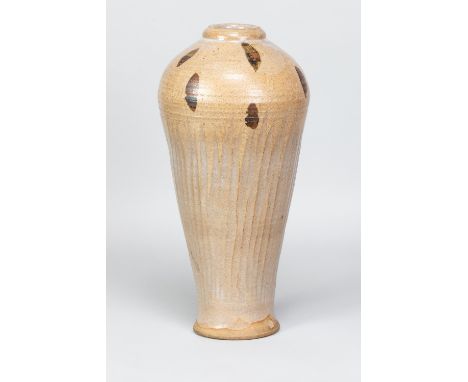 WILLIAM STAITE MURRAY (1881-1962); a tall stoneware bottle with fluted body and iron decoration to shoulder, impressed M mark