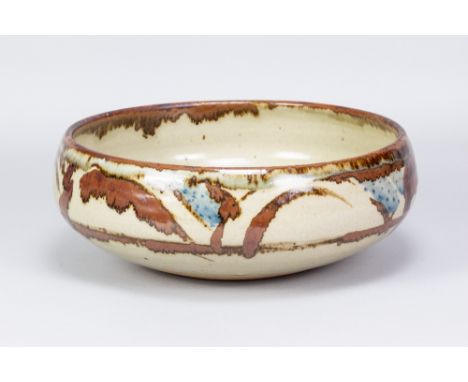 BERNARD LEACH (1887-1979) for Leach Pottery; a very large stoneware bowl with iron and cobalt decoration on pale green ground