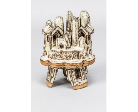 IAN GODFREY (1942-1992); a stoneware casket on tripod feet covered in creamy oatmeal glaze, the cover formed of intrically ca