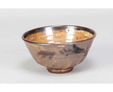 GEOFFREY WHITING (1919-1988) for St Augustine's Pottery; a stoneware chawan with iron decoration on lustrous iron rich ground