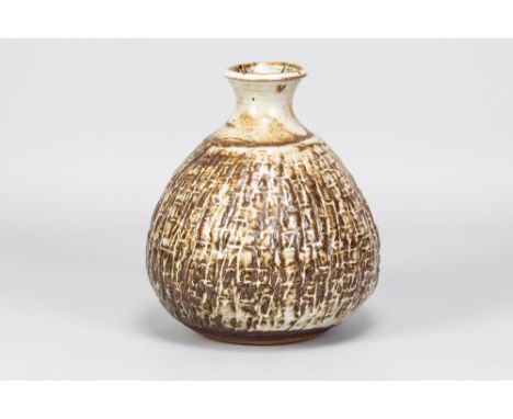 JANET LEACH (1918-1997) for Leach Pottery; a squat stoneware bottle with iron decoration over textured surface, impressed JL 