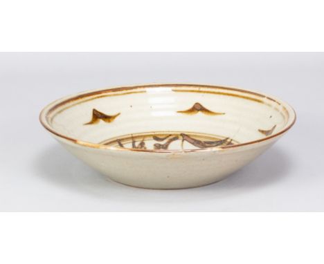 HARRY DAVIS (1910-1986) & MAY DAVIS (1914-1998) for Crowan Pottery; a large stoneware bowl with iron decoration on pale green