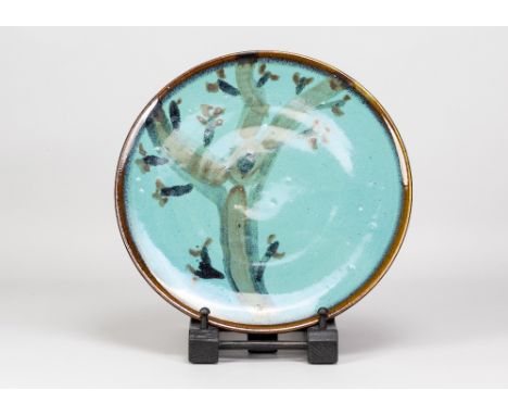 MICHAEL LEACH (1913-1985) for Yelland Pottery; a large stoneware plate covered in turquoise glaze with iron decoration, impre