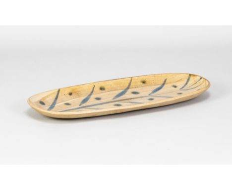 MICHAEL LEACH (1913-1985) for Yelland Pottery; a long stoneware dish with cobalt decoration on oatmeal ground, impressed pott