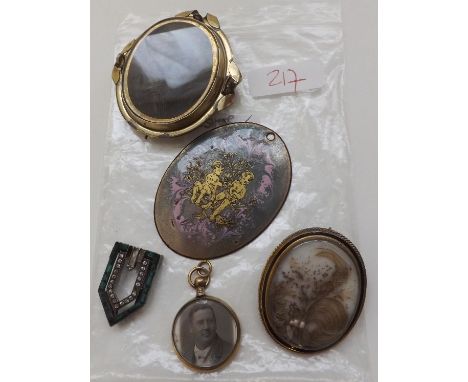 An antique Victorian black enamel and gilt memorial locket also another etc  