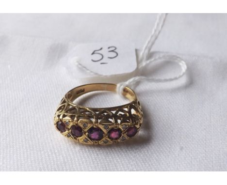 A good ruby & diamond ring in heavy ornate 18ct mount   5.3g size 'P'        