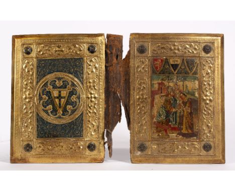 A 19th Century Siennese gilt gesso and wood book cover The upper panel printed with bishop and attendants in a landscape the 