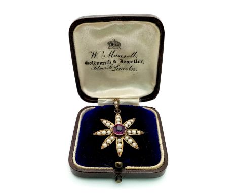 A Beautiful Antique Seed Pearl and Amethyst Pendant. Central amethyst with 24 seed pearls creating a flower effect. 2.5cm. Co