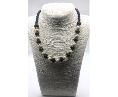 A Freshwater Pearl and Lava Bead Necklace. Sparkly rondelles. 46cm necklace length. 
