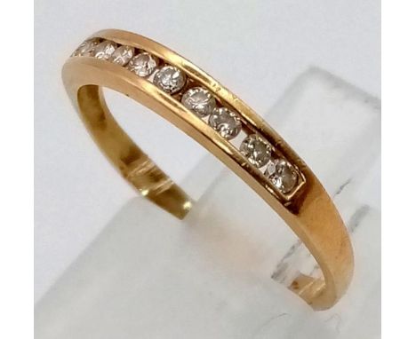 14K YELLOW GOLD DIAMOND 1/2 ETERNITY RING. 1.5G.  SIZE M 0.18CT. 