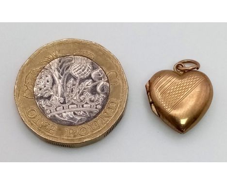 A Vintage 9K Yellow Gold Back and Front Locket. 1.5g total weight. 