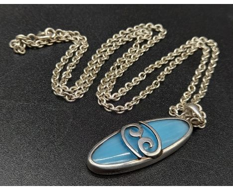 A Vintage Sterling Silver and Turquoise Celtic Style Pendant Necklace 3cm long on 46cm chain 