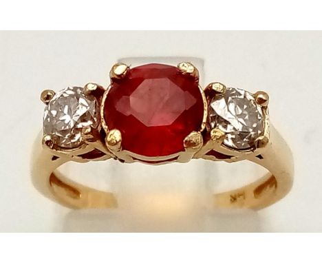 14k yellow gold trilogy ring with ruby and diamonds. Ring size K. Centre ruby 6mm diameter. Total weight 2.69 grams 