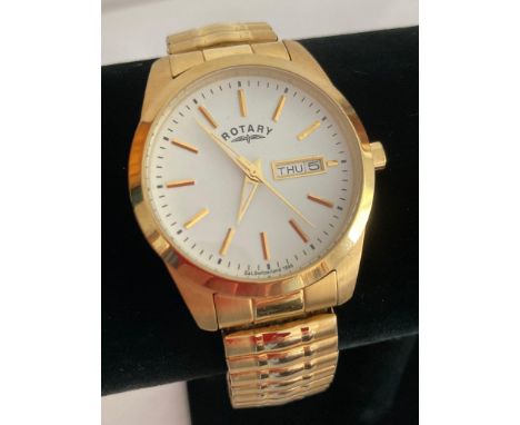 Gentlemans Quartz ROTARY WRISTWATCH in gold tone. Day/Date model,having white face with golden digits and sweeping second han