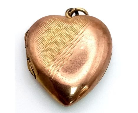 A Vintage 9K Yellow Gold Back and Front Heart Locket Pendant. 3.41g total weight. 