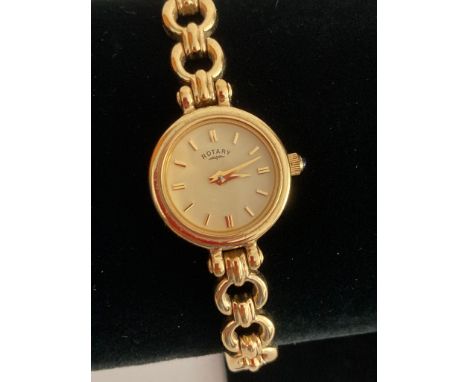 Ladies quartz ROTARY wristwatch in gold tone with circular face and gold tone saddle link bracelet. Full working order. Beaut