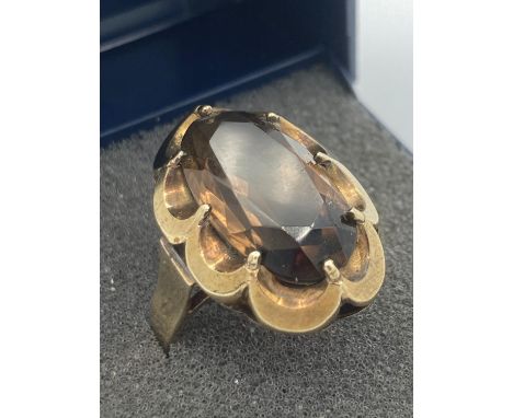 Vintage 1960’s faceted Smokey Quartz GOLD RING. 5.25 grams. Size Q. Extremely large ring in  vintage condition. 