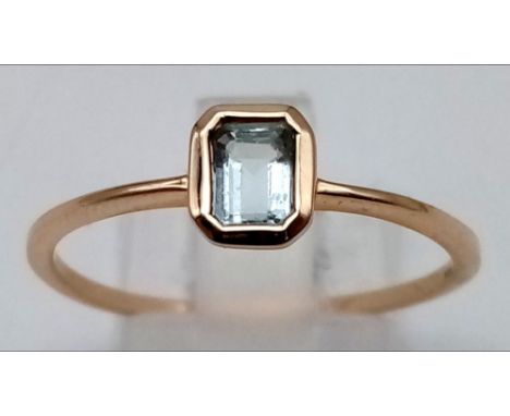 9K YELLOW GOLD AQUAMARINE RING. 1.4G SIZE U 