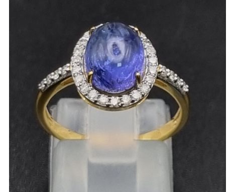2.70cts Tanzanite Gemstone ring with .28cents diamonds in 14kt solid gold. 2.80 grams. Size: N 1/2. Comes with GLI certificat