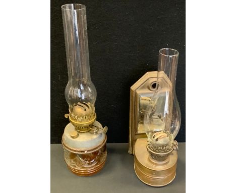 A Victorian brass oil lamp and shade, 45cm high; another Victorian brass wall hanging oil lamp, 38cm high.(2) 