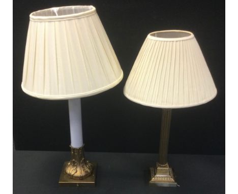 A gilt metal and white glass side light, cast with stiff leaves, 44cm high;  a gilt metal Corinthian column candlestick, 38.5