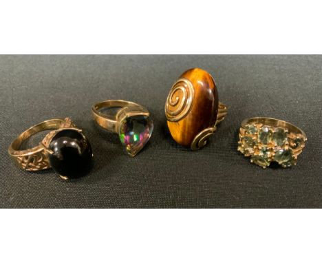 A 9ct gold tigers eye dress ring;  others Gems Tv etc inc mystic topaz, garnet etc, all 9ct gold shanks, all size R, 33g gros