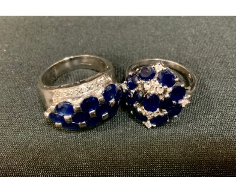 A gems TV sapphire and diamond cluster ring, ten oval brick set blue sapphires flanked by five round brilliant cut diamonds e