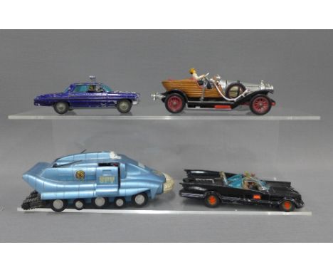 A Dinky Spectrum Pursuit Vehicle and three vintage die cast model Corgi cars to include Bat Mobile, Chitty Chitty Bang Bang, 