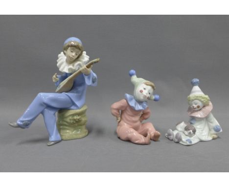 Lladro porcelain clown and two Nao clowns, tallest, 18cm, two with original boxes, (3) 