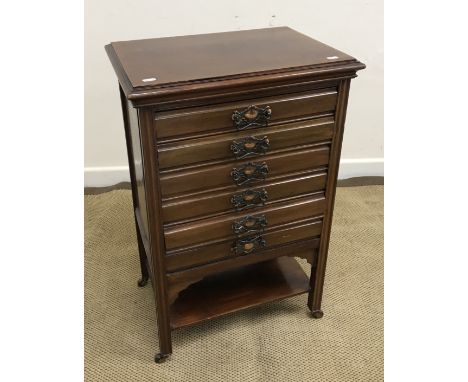 A circa 1900 mahogany music chest of six drawers, each containing various books of sheet music, 51 cm wide x 36 cm deep x 79.