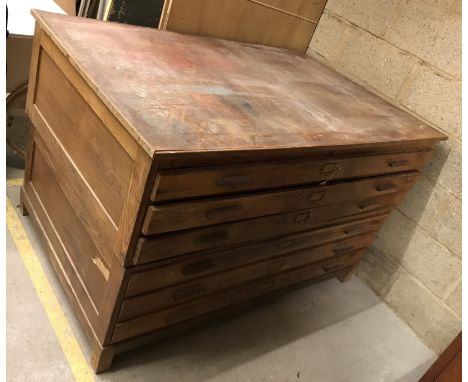A mid 20th Century light oak plan or folio chest of six long drawers in two sections, 150.5 cm wide x 100 cm deep x 95 cm hig