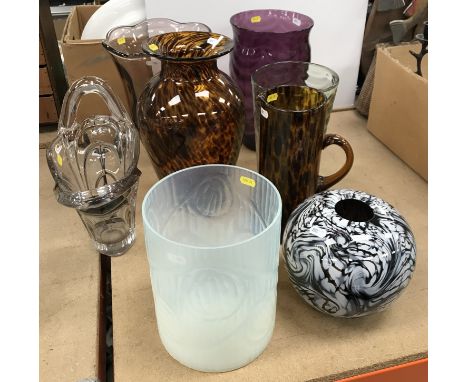 A Lalique style opalescent cyclindrical vase with faceted fruit decoration 22.5 cm high x 17.5 cm diameter, a black and white