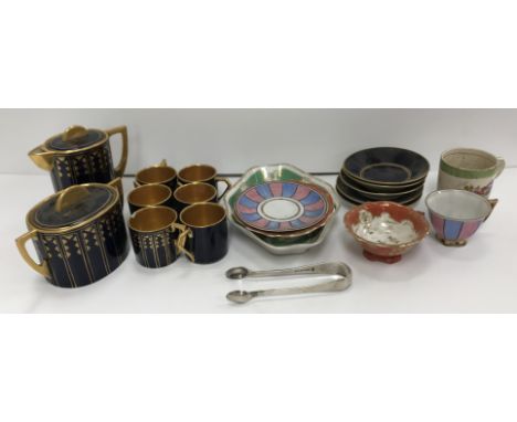 An Ernst Wahliss Alexandra Porcelain Works Turn "Vienna" coffee set comprising six coffee cans, two matching saucers, three s