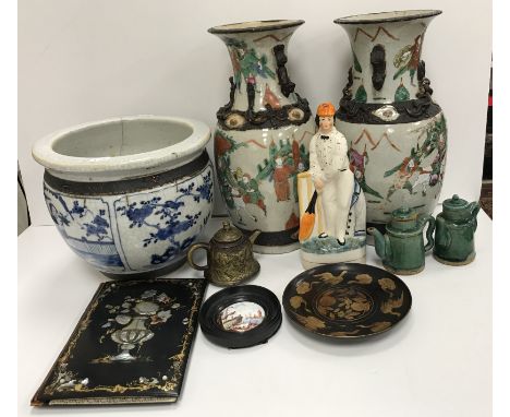 A Chinese crackle ware and matt brown banded jardiniere, 21 cm high, a pair of crackle ware and matt brown embellished vases 